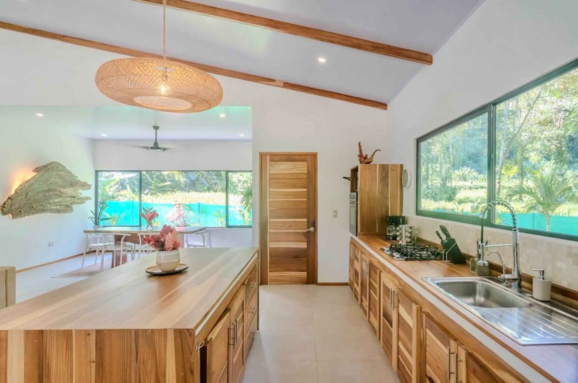 Exterior view of the tropical retreat nestled in Costa Rican jungle